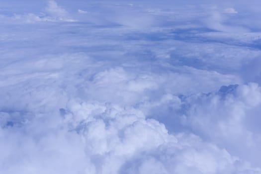 Sky clouds.  Over the Clouds.  Cloudscape. Blue sky and white cloud. Cumulus cloud