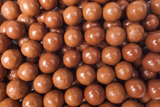 Chocolate candies  background.  Closeup brown chocolate candy background