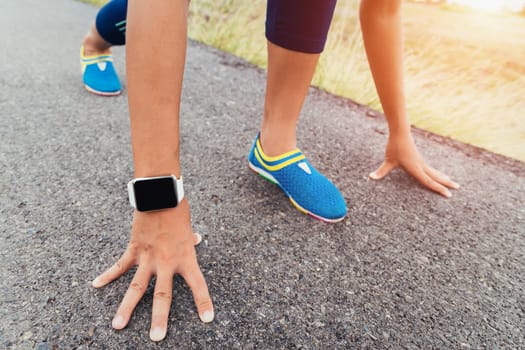 runner gesture ready start to run on road