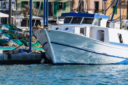 White fishing boat or trawler in the port of Port Andratx,Spain..