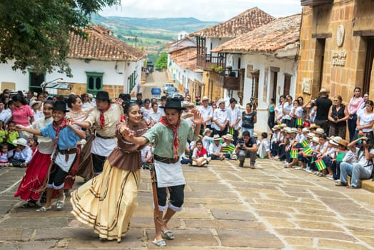 BARICHARA, COLOMBIA - MAY 13: Dancers at a festival perform in Barichara, Colombia on May 13, 2016