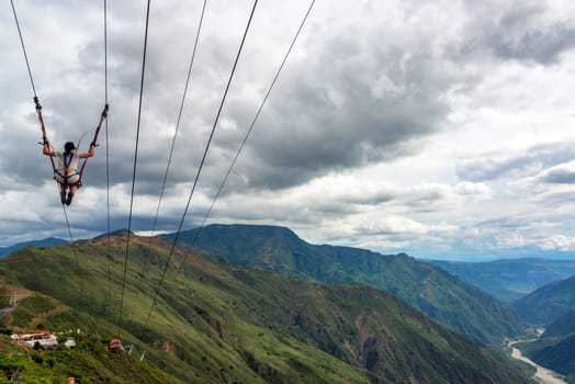 CHICAMOCHA CANYON, COLOMBIA - MAY 8: Woman zip lines through Chicamocha Canyon, Colombia on May 8, 2016