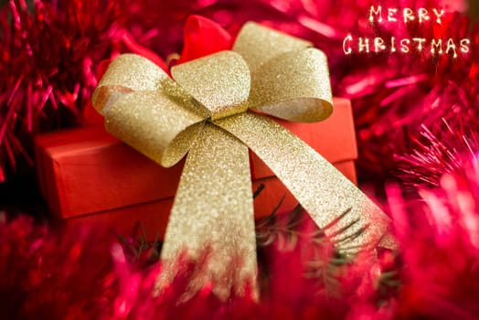 close up on christmas gift on red background