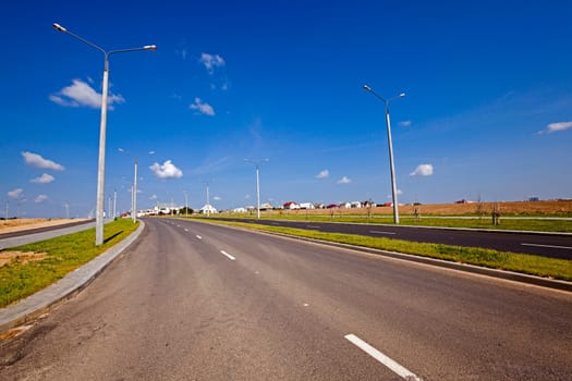 the constructed new road in the new district of the city under construction