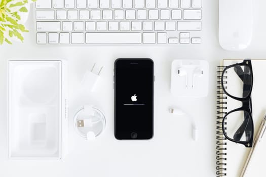 Bangkok, Thailand - October 22, 2016: iPhone 7 and all device set on table, new iPhone 7 is manufactured by apple Inc.