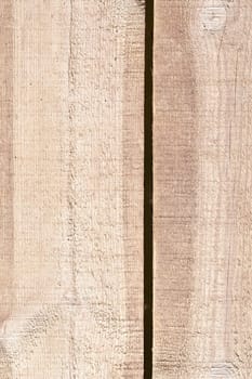 photographed wooden surface made of planks. Part of the old building structure