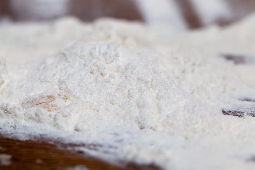 Photo of flour, which is used for making bread, close-up, small depth of field