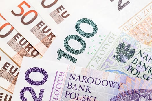 photographed close-up paper money of Poland - zloty and euro