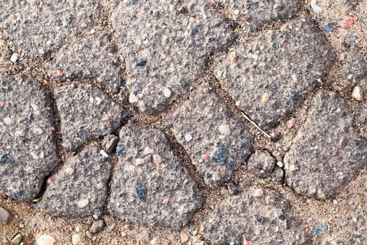 photographed close-up part of the road on which the broken cover - asphalt