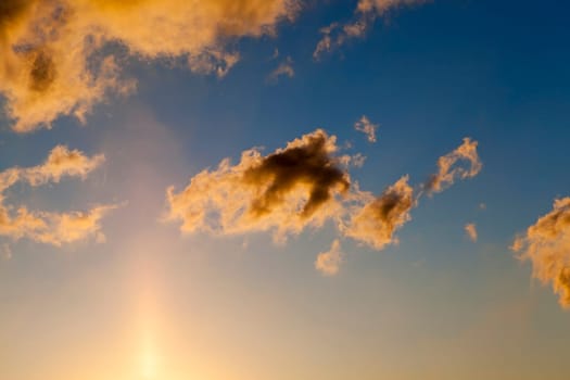 photographed part of a colorful sky with clouds at sunset, sun dawn