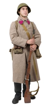 young Soviet soldier with winter uniform isolated on the white background