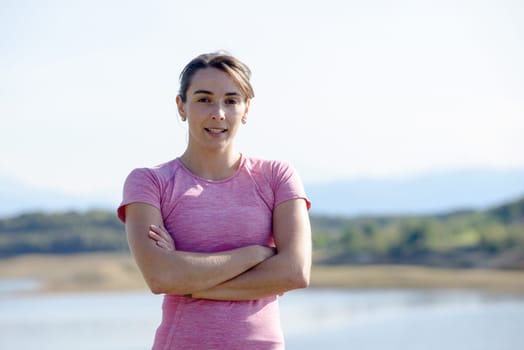 portrait of a young sporty woman in the countryside
