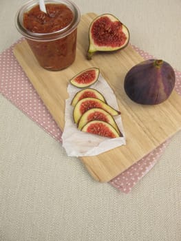 Homemade fig mustard in the glass and fresh figs