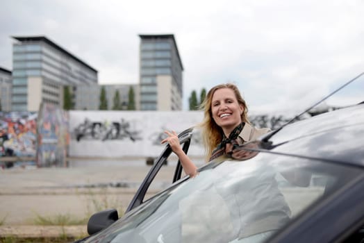 Businesswoman at the car