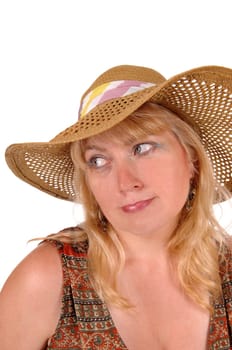 A portrait image of a pretty blond woman in a dress wearing a straw.hat, isolated for white background..