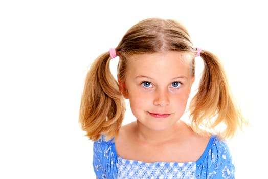 portrait of a little blond girl with pigtails