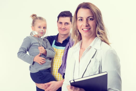 young beautiful businesswoman and her husband with child in background
