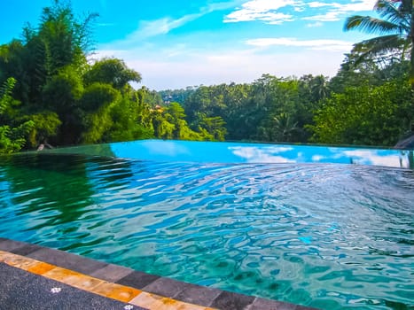 Bali, Indonesia - April 11, 2012: The view of swimming pool at Tanah Merah Art Resort