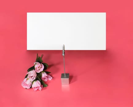 A note holder with a roses and a empty card for your text