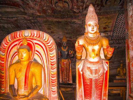 Dambulla, Sri Lanka - April 30, 2009: Buddha sculptures at Buddhists' cave temple in Dambulla at Sri Lanka