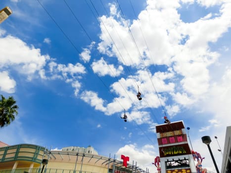 Las Vegas, United States of America - May 07, 2016: The people at the SlotZilla zip line attraction at the Fremont Street Experience at Las Vegas, USA on May 07, 2016