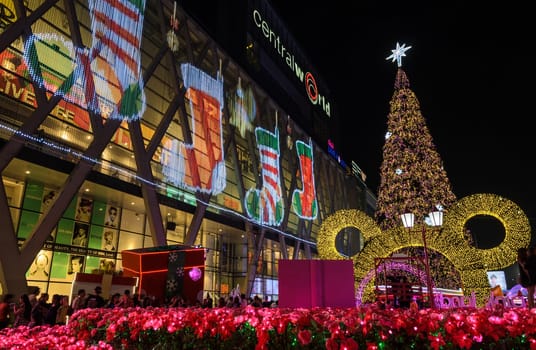 BANGKOK, THAILAND - DECEMBER 21, 2015 : Night illumination of Christmas and New Year celebration 2016 at Central World shopping mall, Ratchaprasong intersection in Bangkok, Thailand. Decorated in concept of Disneyland fairy tale