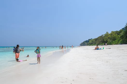 Phang Nga, Thailand-FEBRUARY 15, 2015 : Tourists at crystal clear water as emeral and white sand beach of Tachai island in Phang-nga, Thailand.