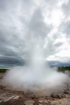 Strokkur geysir blowing high, Iceland in June