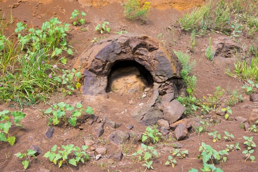 Broken stone formation resembling a dinosaur egg with prodellanym hole found near the village of Wet Olhovka Kotovo District, Volgograd Region, Russia