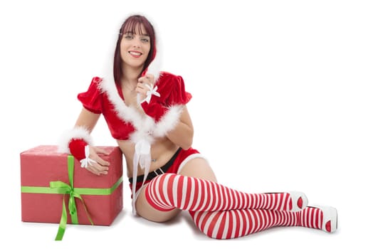 pretty young girl dressed as Santa on the floor