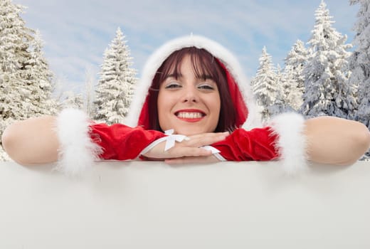 Portrait of beautiful sexy woman wearing santa claus clothes