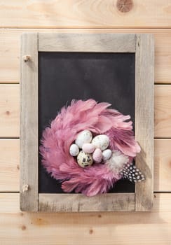 Rustic background at Easter with colorful Easter eggs