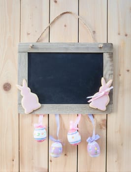 Rustic background at Easter with colorful Easter eggs
