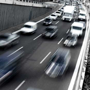 traffic on a highway in early morning