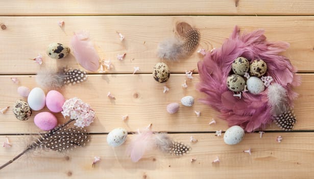 Rustic background at Easter with colorful Easter eggs