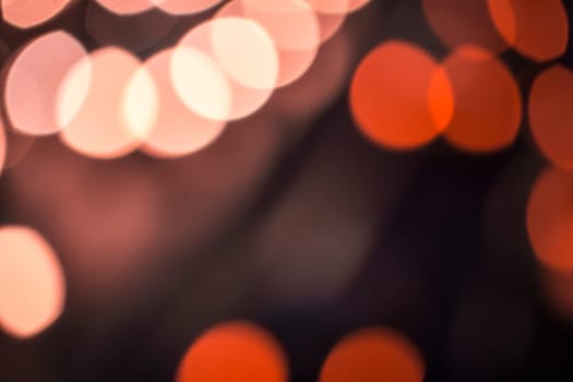 bokeh effect of cars on a highway by night