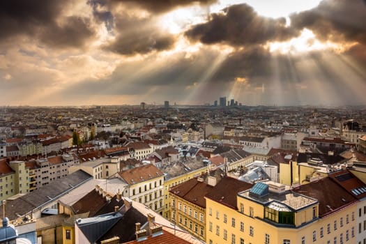 Vienna,city view at dusk,bird's eye view of the city with sun rays in the evening