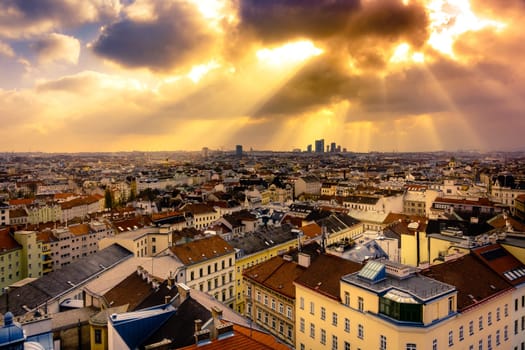 Vienna,city view at dusk,bird's eye view of the city with sun rays in the evening