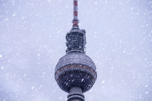 television tower in berlin with snow