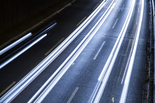 cars on highway in blue light