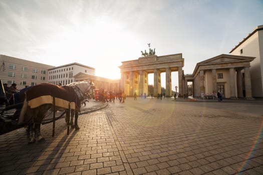 pariser platz in berlin with brandenburger tor and carriage