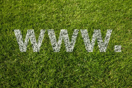 www. text in white letters on meadow
