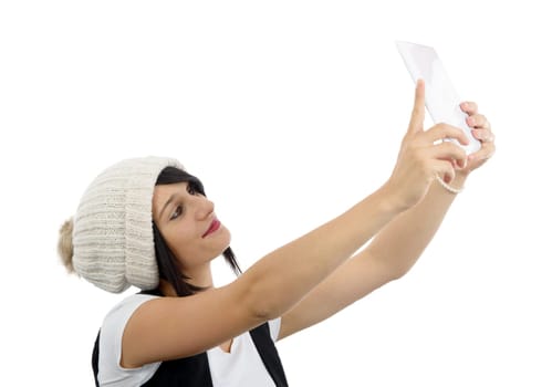 young woman with a tablet makes a selfie isolated on white background
