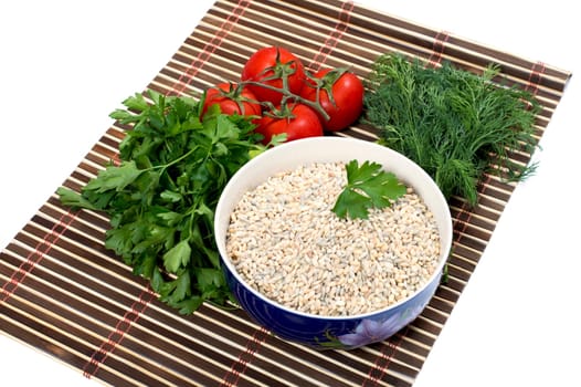 plate with pearl barley, nearby parsley, tomatoes, fennel, on a rug, a subject products, vegetables