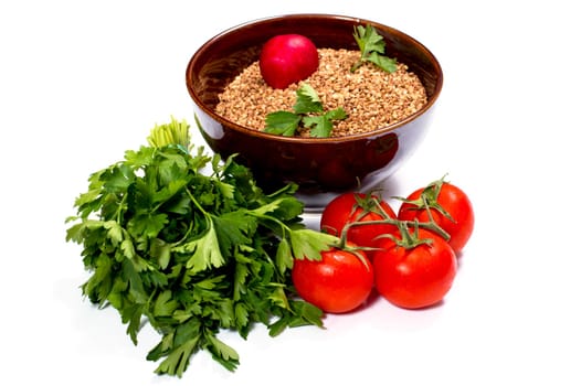 bowl with buckwheat, parsley, fennel and tomatoes, isolate, a subject products