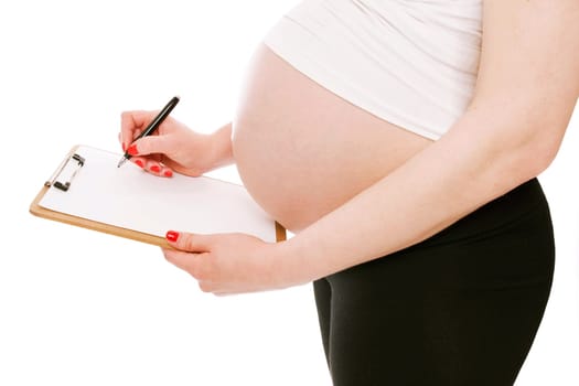 Beautiful young pregnant woman showing  folder or tablet with blank white screen for copy space or advertising area