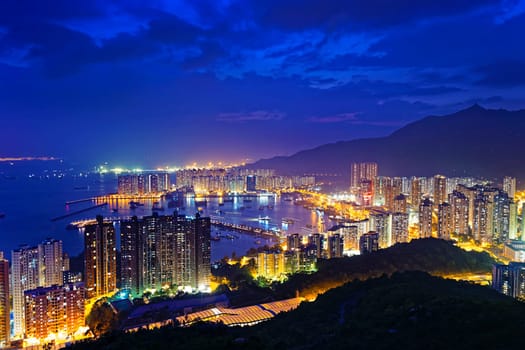Hong Kong Tuen Mun skyline and South China sea at night
