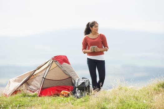 Teenage Girl On Camping Trip In Countryside
