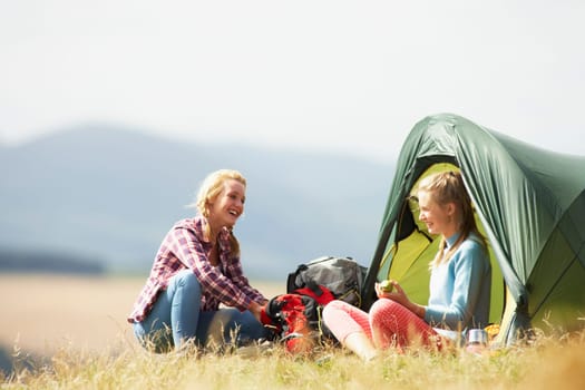 Two Teenage Girls On Camping Trip In Countryside