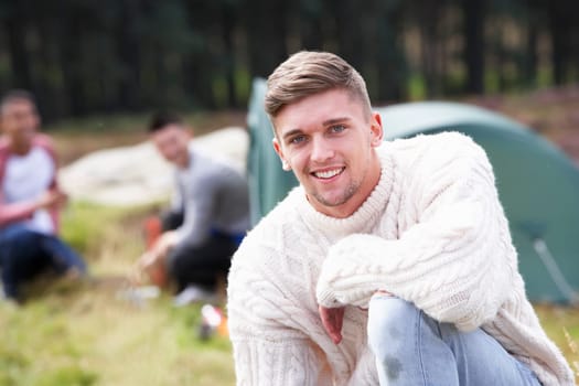 Group Of Young Men On Camping Trip In Countryside